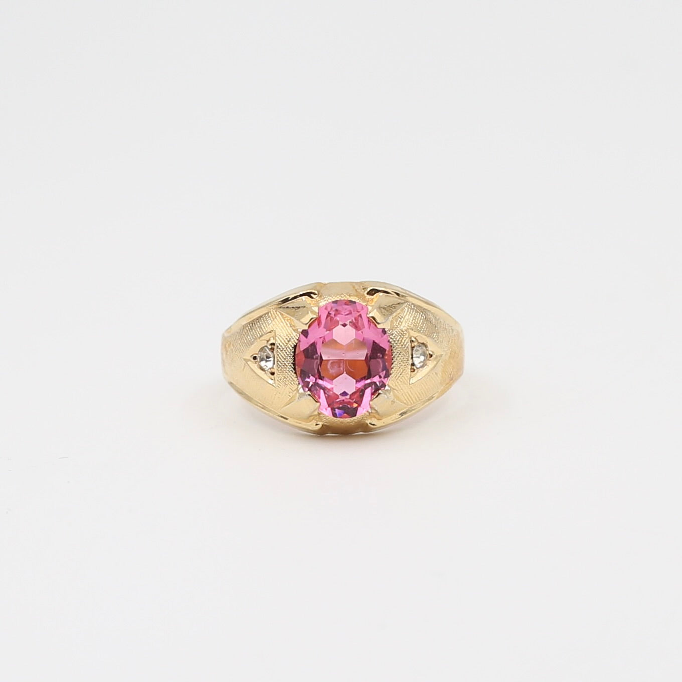 Costume gold toned with pink stone ring
