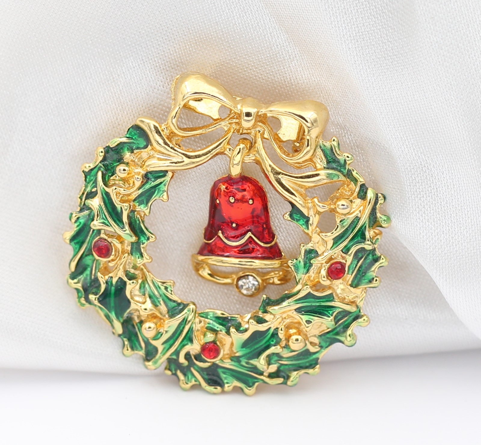 Christmas Wreath with Gold Tone Metal Bow and red dangling bell with rhinestone diamond